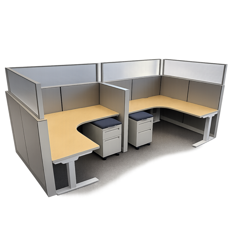 Office cubicles with L-shaped beige desks, gray partition panels, and mobile pedestal drawers between workstations.